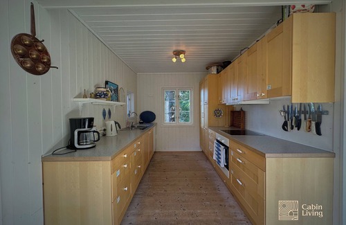 Kragero Cabina | Seaside cabin with boat and beach in Kragerø