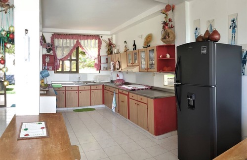 Puerto Escondido Casa | Cabaña a orilla del mar con piscina y playa privada