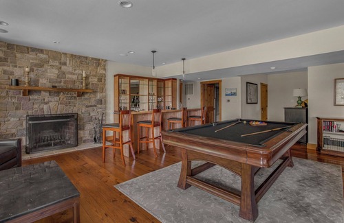 Huntly Casa | Secluded 4 bedroom log style home with screened porches, deck and fishing pond.