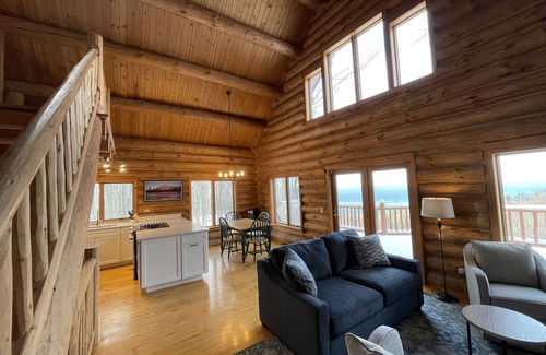 Lake Leelanau Cabina | Secluded Log Cabin Retreat on 11 Wooded Acres with Hot Tub & Lake Michigan Views