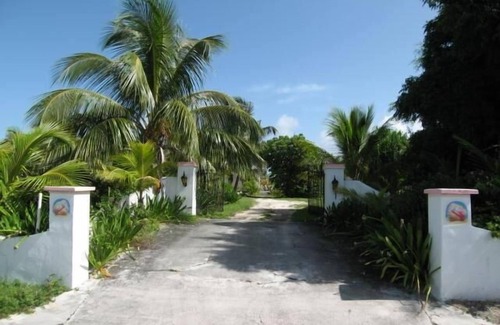 Spanish Wells Villa | Aislado, privado, cerrado Beachfront Estate Villa W / Embarcación a motor, Kayak, y Bicicletas