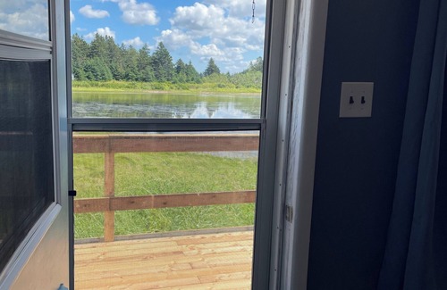 Tracadie Cabaña | Secluded Waterfront Cottage with Kayaks