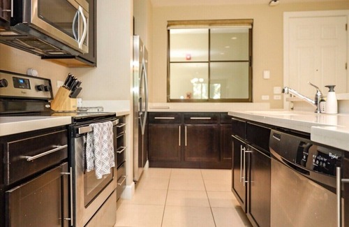 Coco Condominio | Second Floor Breezes - Beach Club Access - Terrace w/Grill - Walk to Shops & Restaurants