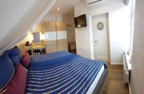 Tossens Cabaña | Segel-zimmer - Ferienzimmer Villa Küstenwind