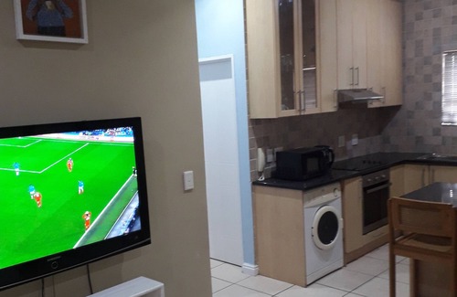 Bloubergstrand Apartamento | Apartamento de 2 dormitorios con cocina