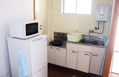 Kasuga Apartamento | wifi Amenity es un dormitorio sencillo a solo 10 minutos de la estación JR Kasuga.