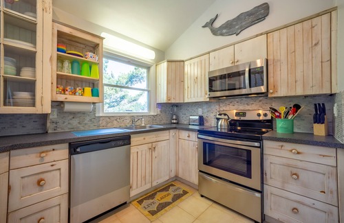 Ocean Isle Estates Casa | Semi-oceanfront dog-friendly home with private hot tub, decks & shared pool