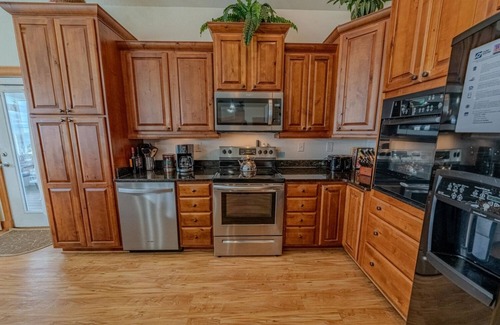 Wind Over Waves Casa | Semi-Soundfront: Pool, Hot Tub, Game Room, Elevator, Boat Ramp, Linens Included