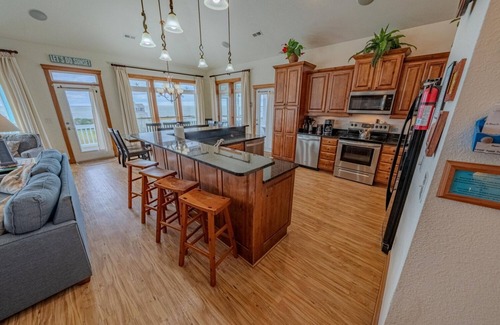 Wind Over Waves Casa | Semi-Soundfront: Pool, Hot Tub, Game Room, Elevator, Boat Ramp, Linens Included