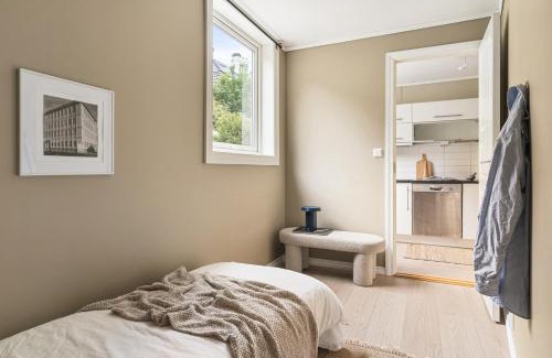 Arstad Apartamento | Sentral leilighet med parkering og peis