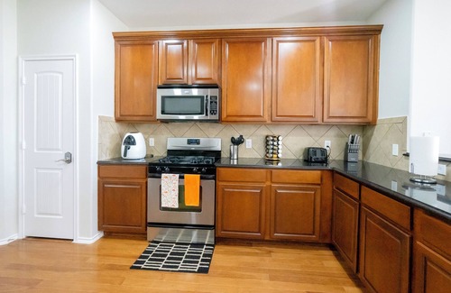 McKinney Casa | Serene 4-bedroom house with BBQ, 5-TVs in McKinney facing Park & Pond sleep 12