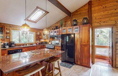 Volcano Casa | Serene 5-acre tropical hideaway with lanai and circular wood-burning fireplace