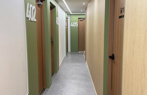 Jung-gu Casa | Serene building with WiFi in beautiful Busan There is a large bed.