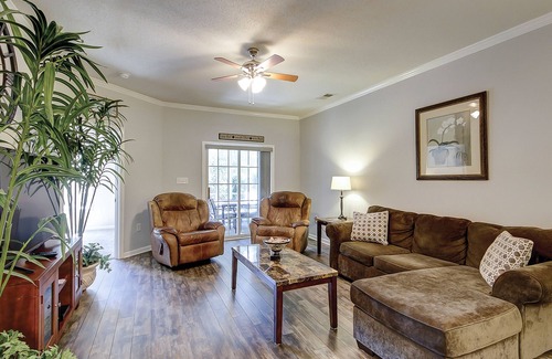 Surfside Beach Condominio | Serene ground-floor condo in great location with pool access - dog-friendly
