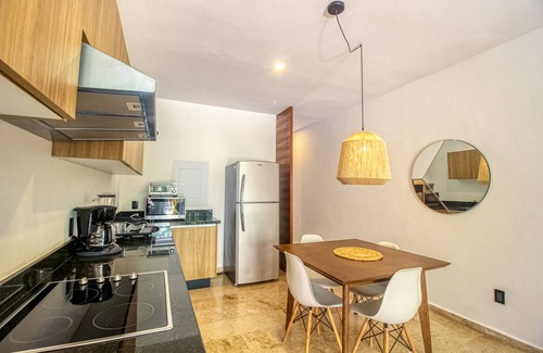 La Veleta Apartamento | Serene, ground-floor getaway with private & shared pool, washer/dryer, & patio