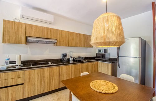 La Veleta Apartamento | Serene, ground-floor getaway with private & shared pool, washer/dryer, & patio