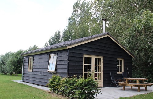 Lage Zwaluwe Casa | Acogedora casa de vacaciones con terraza cerca del Parque Nacional "De Biesbosch"