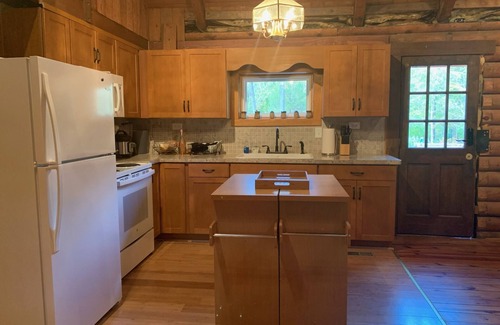 Apex Casa | Serene Log Home w pond, fenced-in yard & pastures
