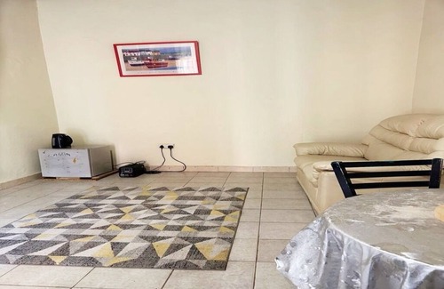 Kololi Apartamento | Serene Room and Living Room