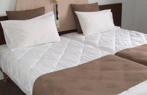 Lourdes Hotel | Serene & Spacious Unit with Balcony, Free Parking, Onsite Restaurant!