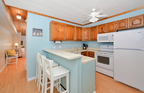 Selbyville Casa | Serene Waterfront Home En Fenwick Island - Pasos para la piscina. Minutos a la playa.