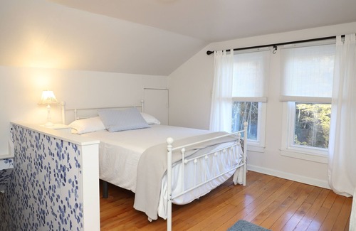 Sparta Otro | Serenity abounds in this beautiful 93-year-old farmhouse with mountain views.