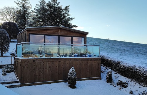 Portaferry Chalet De Esquí | Set on an elevated private site with commanding views over Strangford Lough.