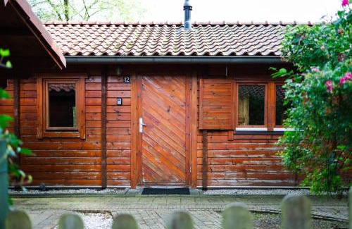 Epe Casa | Sfeervol houten huisje met omheinde tuin op de Veluwe