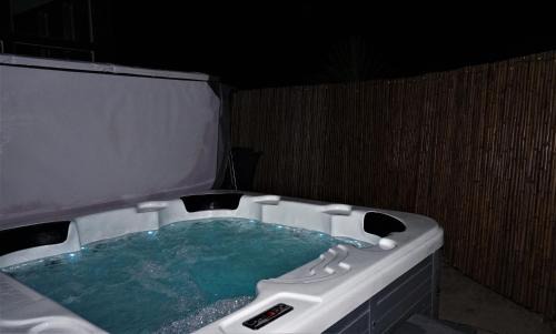 Llanfyllin Casa | Sheep Dip Cottage - 5* Cyfie Farm, with log burner and private hot tub
