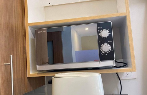 Barangay 76 Condominio | Shore 3 Residences Authentic Japanese-Style Bedroom with Pool View - MOA Complex