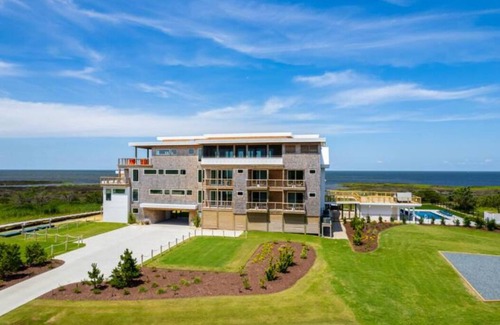 Salvo Casa | Simply the Finest - New Modern Waterfront Home w/ Saltwater Pool