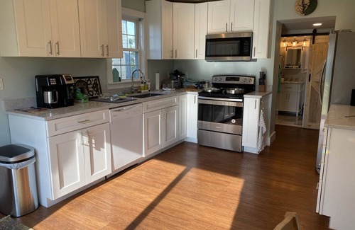 Fishing Creek Casa | Single family home with screened porch.