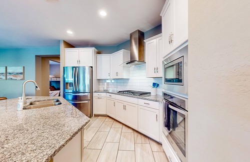 Canyon Trails West Casa | Single-story home with enclosed yard, private pool, hot tub, patio, & grill