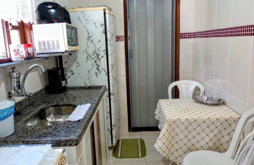 Rio das Ostras Casa | Single-story linear house with swimming pool in Atlântico.