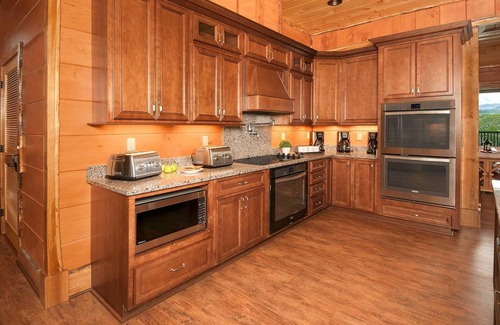 Gatlinburg - Pigeon Forge Cabina | Contáctenos para obtener un 15% de descuento adicional en una nueva estadía del 15 de julio al 28 de agosto de 2019