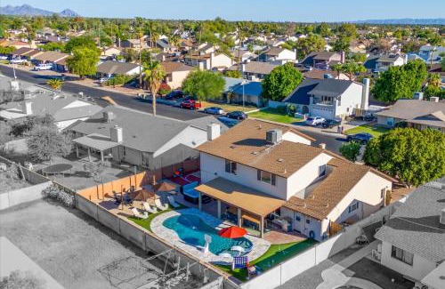 Copperwood Casa | Slide into Fun Pool Games Fire Pit Sport Court