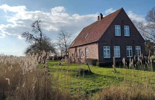 Butjadingen Cabaña | Small farmhouse from 1927 with 1,600 sqm garden plot, 3 kilometers to the dike