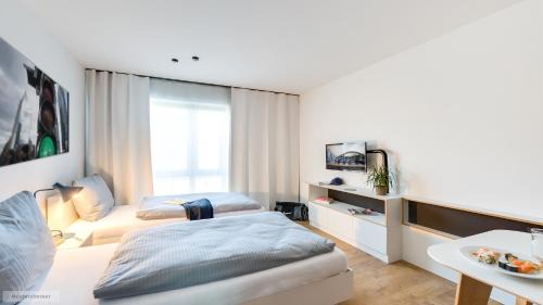 Frankfurt Airport Area Apartamento | smartments Frankfurt Airport