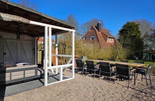 Altfunnixsiel Apartamento | Smittshörn 3 - Nordsee Erdgeschosswohnung mit eingezäunten Garten, Kamin und Lounge!