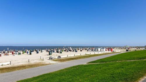 Altfunnixsiel Apartamento | Smittshörn 3 - Nordsee Erdgeschosswohnung mit eingezäunten Garten, Kamin und Lounge!