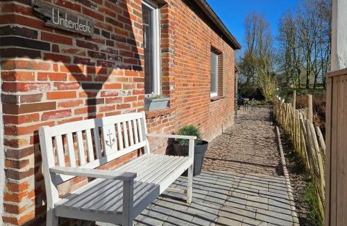 Altfunnixsiel Casa | Smittshörn 3 - Nordsee Ferienhaus für Gruppen und Familien mit eingezäunten Garten