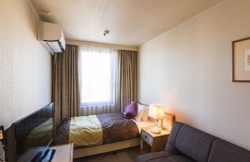 Kintaro Onsen Hotel | Smoking Single with sofa Slightly larger room fo / Uozu Toyama