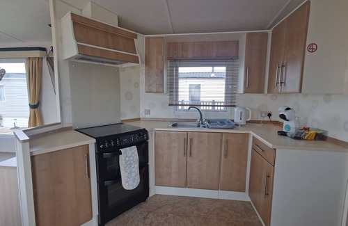 Llwyngwril Chalet De Esquí | Snowdonia Holiday Sea Beach and Mountains view