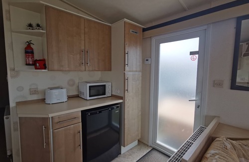 Llwyngwril Chalet De Esquí | Snowdonia Holiday Sea Beach and Mountains view