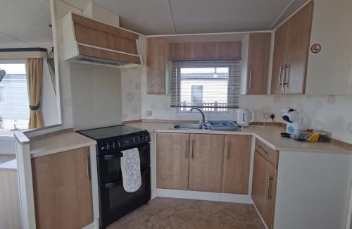 Llwyngwril Chalet De Esquí | Snowdonia Holiday Sea Beach and Mountains view