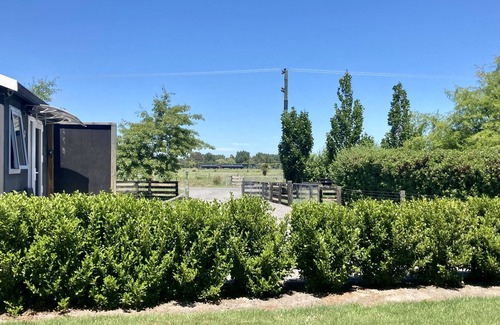 Lincoln Cabaña | Soak up the Peach & Quiet at an animal Friendly Boutique Farm Cottage
