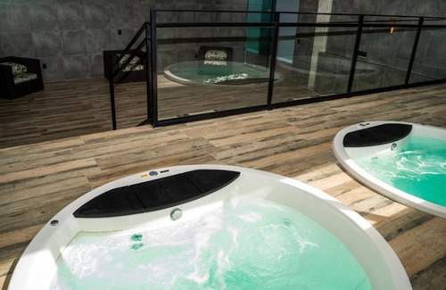 Praia da Armacao do Itapocoroi Apartamento | Solar stone hotel on the island.