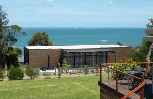 Somers Apartamento | Somers alojamiento de vacaciones, con impresionantes vistas al mar balcón y jardín privado
