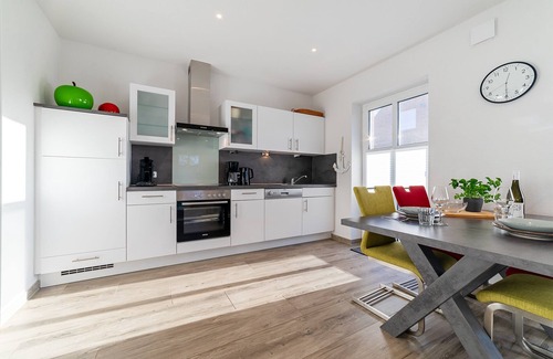 Greetsiel Apartamento | Sonnenseite: Moderne Ferienwohnung für Ihren Perfekten Urlaub