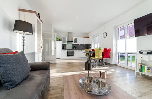 Greetsiel Apartamento | Sonnenseite: Moderne Ferienwohnung für Ihren Perfekten Urlaub